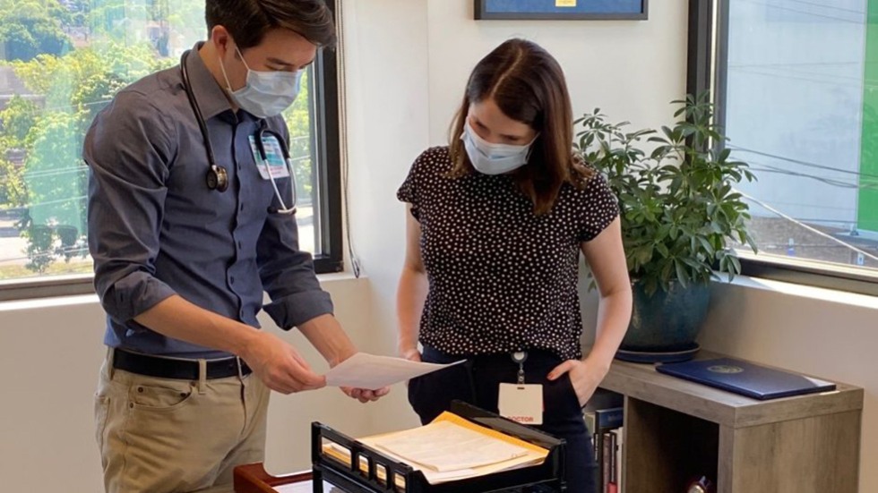 two people in an office
